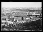 Showing reconstruction in Tulsa, Okla. This part of town was demolished by fire in the race riots of June 1921