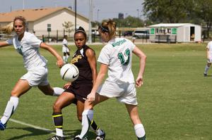 Tiffany Adams and Danielle Herron going after ball