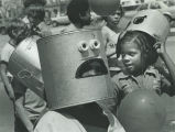 Children wearing ice cream carton masks