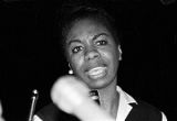 Nina Simone performing at the "Stars for Freedom" rally at the City of St. Jude in Montgomery, Alabama, the night before the end of the Selma to Montgomery March.