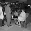 Fred Shuttlesworth speaking to Freedom Riders Catherine Burks Brooks, Lucretia Collins, and Salynn McCollum in the waiting area of the Greyhound station in Birmingham, Alabama.