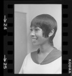 Woman modeling African American hairstyle, 1972