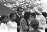 Harry Belafonte and other mourners at South View Cemetery for Martin Luther King, Jr.'s funeral.