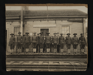 Group of World War I soldiers and railroad employees at Kittery Junction Station