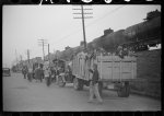 [Untitled photo, possibly related to: Day laborers being hired for cotton picking on Mississippi and Arkansas plantations. Between four and six-thirty every morning during the season, near the Hallan Bridge in Memphis, Tennessee, crowds of Negroes in the streets gather and are loaded into trucks by drivers who bid, and offer them anywhere from fifty cents to one dollar per day]