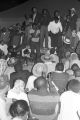 Young man addressing an audience in front of a tent at an evening gathering during the "March Against Fear" through Mississippi, begun by James Meredith.