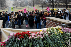 Thumbnail for Justice for Jason rally at UMass Amherst: flowers and protesters outside the Student Union Building in support of Jason Vassell