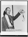 Noose sent to NAACP--Roy Wilkins, NAACP executive secretary, displays hangman's noose sent to Association's national headquarters from Florida