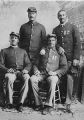 Group studio portrait of four African American officers, Company D, 25th United States Infantry Regiment "Buffalo Soldiers", Fort Custer, Montana, ca. 1889