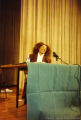 Terry McMillan speaking at a conference