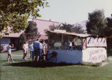 Image of signs, protests and displays put together by the SAA group on the University of Utah campus during political activity of the worldwide community to put an end to segregation in South Africa.