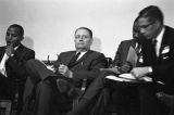 Congressman Carl Elliott seated with other men during a meeting of educators at Alabama State College in Montgomery, Alabama.