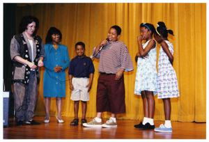 Links Members and Children on Stage