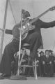 B. B. King: New Haven, Conn. Yale University Graduation. B. B. King at podium, performing at graduation ceremony (BKP 26-77-5/15)