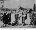 Redmen baseball team posing with women, Seattle, ca. 1915