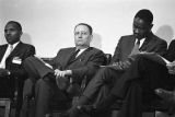 Congressman Carl Elliott seated with two other men during a meeting of educators at Alabama State College in Montgomery, Alabama.