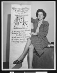 Anne Shore presents a Christmas Card for the U.S. Attorney, Dec. 1948, Los Angeles