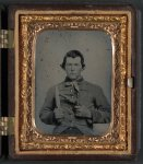 [Unidentified soldier in Confederate uniform with bowie knife and single shot pistol]