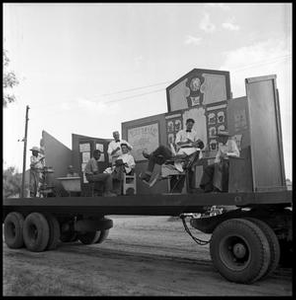 Men on a Barber Shop Parade Float