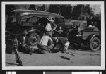 Afro-American and Caucasian employees for the Bureau of Standards and Sewer Maintenance working on a sewer, ca.1920