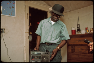 Outsider art: Theodore Hill. Theodore Hill in his living room