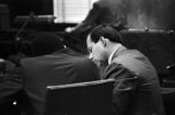 Anthony Ray Hinton conferring with his lawyer, Sheldon Perhacs, during his capital murder trial in Birmingham, Alabama.