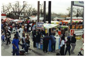 Mario, Edwina, and Angela Salas Inside Booth During Martin Luther King March