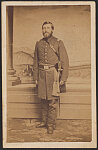 [First Lieutenant Charles E. Tibbetts of Cos. A and C, 13th Connecticut Infantry Regiment in uniform with sword in front of painted backdrop showing mountains]