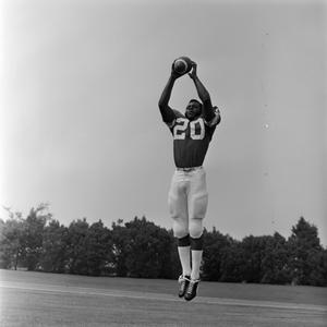 NTSU player catching a ball, 29