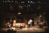 Actors and actresses in a scene from the play A raisin in the sun