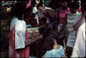 Atlanta, Georgia, 1988: National Black Arts Festival. African American hair braiding