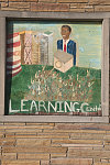 Jumpstart Learning Center.  Mrs. Lockhard, the center's director explained, "We love Obama here." The mural was commissioned for $150 from a folk artist living in Oak Park, Michigan. West Chicago Ave. at Birwood St., Detroit, 2012