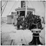 [Unknown location. Officers of the U.S.S. Philadelphia before pilot-house]