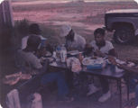 Members of the American Agriculture Movement eating barbecue at a gathering on Oscar Belvin’s farm in Montezuma, Georgia.