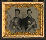 [Two unidentified soldiers, possibly brothers, in uniform with muskets]