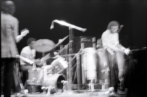 Miles Davis in performance: band in action (blurred)