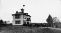 Unidentified school with large gathering of people