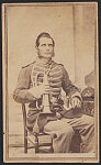 [Fifer Harley R. Decker of Co. F, 26th Michigan Infantry Regiment in uniform with bugle and sword]