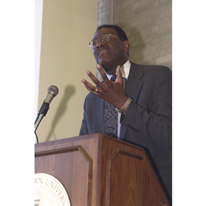 Thumbnail for Unidentified man speaking at podium