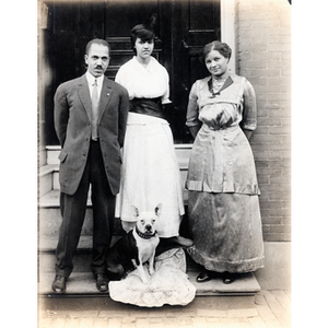 Family portrait, family of three with dog