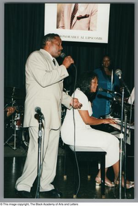 Photograph of Cavin Yarbrough and Alisa Peoples performing on stage