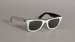 Sunglasses with white frames worn by André 3000 of Outkast