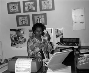 Woman at a desk, 2