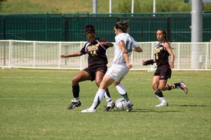 Heather Hutyra maneuvering the soccer ball