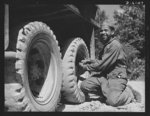 Fort Knox. Negro mechanics. He helps to keep 'em rolling at Fort Knox, Kentucky. This Negro soldier, who serves as truck driver and mechanic, plays an important part in keeping the army's transport fleets in service