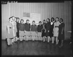 New recruits of WAACS sworn in. Part of a class of sixteen young women sworn into the Women's Army Auxiliary Corps by Major Ina M. McFadden, recruiting officer for the Washington Military District, Thursday evening, January 7, at a public ceremony at the Cordoza High School. Those sworn into the Women's Army Auxiliary Corps and now awaiting call to active duty are: Misses Neppie Stoker Anderson, Joye Pamela Arnold, Elizabeth Orlean Garrett, Juanita Greene, Elsie Givens, Farieta Hall, Lillie B. Harrison, Marie Humphrey, Nancy McCall, Evelyn F. Overton, Isabelle Peterson, Mittie Lee Thomas, Grace Elizabeth Thompson, Jeanne Cecelia Webster, Catherine Geneva Brown and Ernestine Louise Woods. A drive for 150 Negro recruits from the Military District of Washington is now in progress, Major McFadden announced