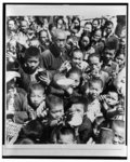 [Large group of children and adults begging for food in the Hunan Province, China]