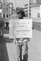 Picketer protesting at the county courthouse in Mobile, Alabama, during the investigation into the murder of Michael Donald.