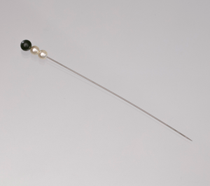 Hatpin decorated with pearl and black beads from Mae's Millinery Shop