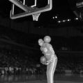 Harlem Globetrotter "Curly" Neal performing basketball tricks at an exhibition game in Birmingham, Alabama.